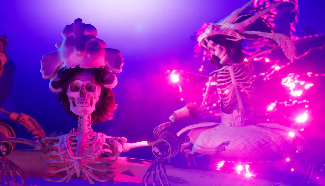 Behind-the-scenes clay render of Santa Catrina 3D animation showing a skeleton inside a boiling pot as a sacrifice to the lightning deity Tlaloc, with untextured world and characters